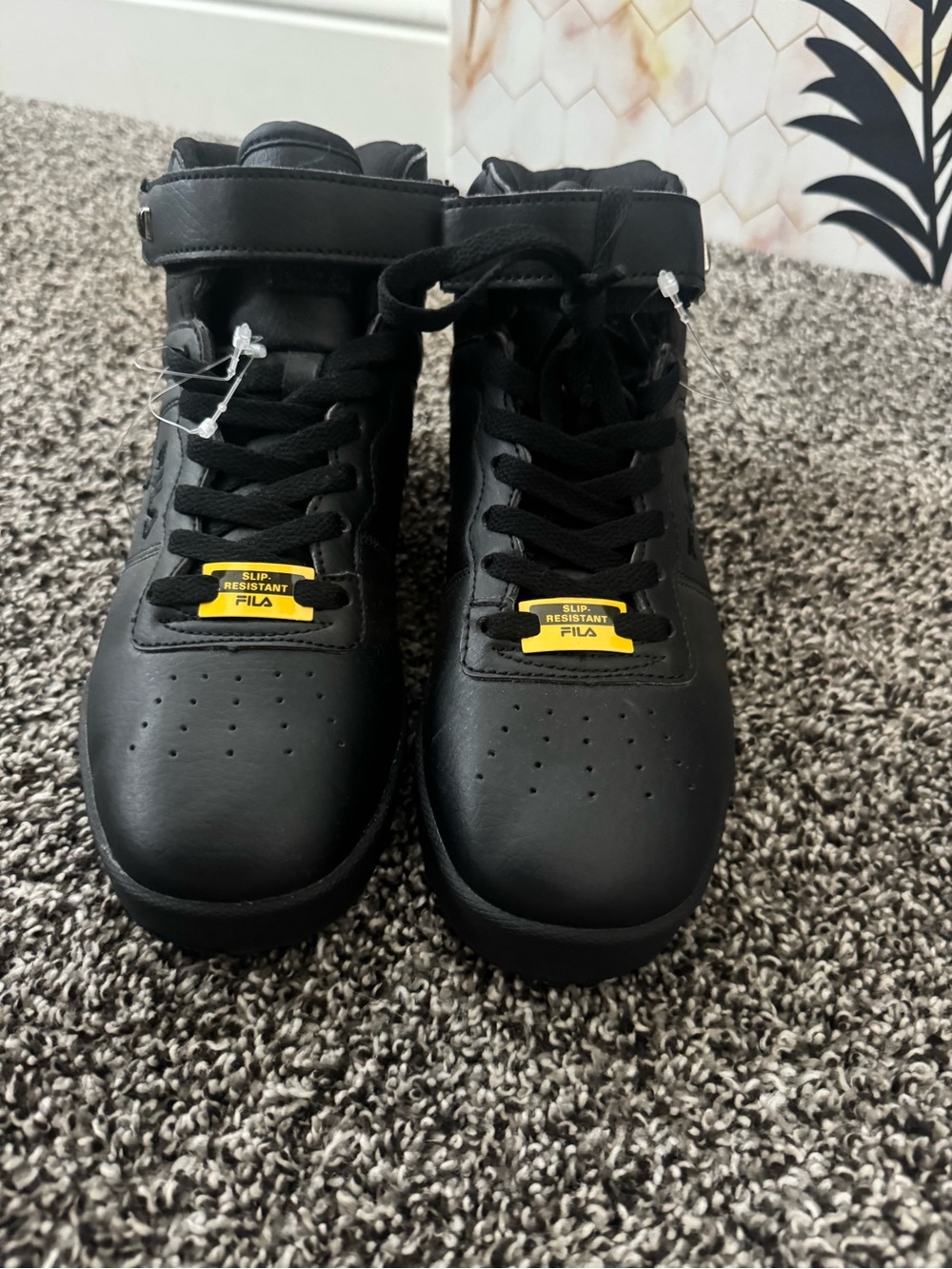 Fila Black High-Top Sneakers with Yellow Accent